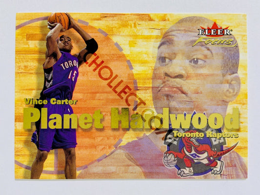 Vince Carter – Toronto Raptors 2000-01 Fleer Focus Planet Hardwood #1