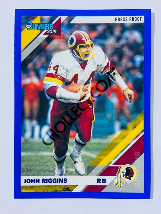 John Riggins – Washington Commanders 2019-20 Panini Donruss Blue Press Proof Parallel #184